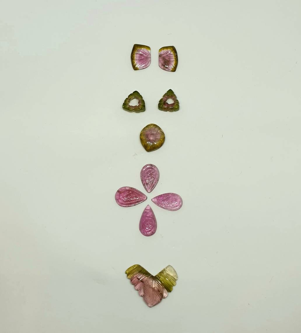 33 carats carved watermelon Tourmaline set